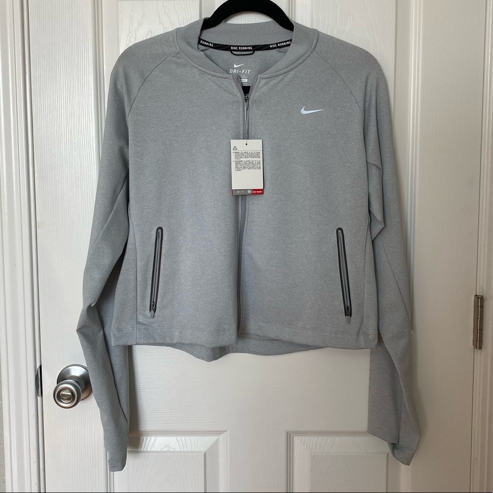 New with tag- Running crop jacket with reflectors and thumb holes